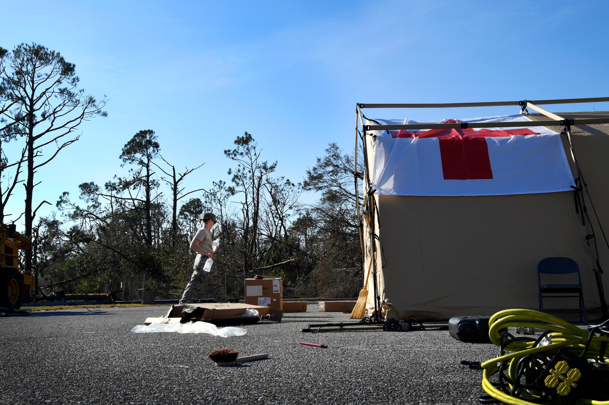 Staff Sgt. Bailey Holt, 96th Medical Group medical technician, unloads medical supplies at Tyndall Air Force Base, Florida, Oct. 15, 2018. Members from Moody Air Force Base travelled down to support standing up an operational medical facility after Hurricane Michael devastated the base. (U.S. Air Force photo by SSgt Matthew Lotz)