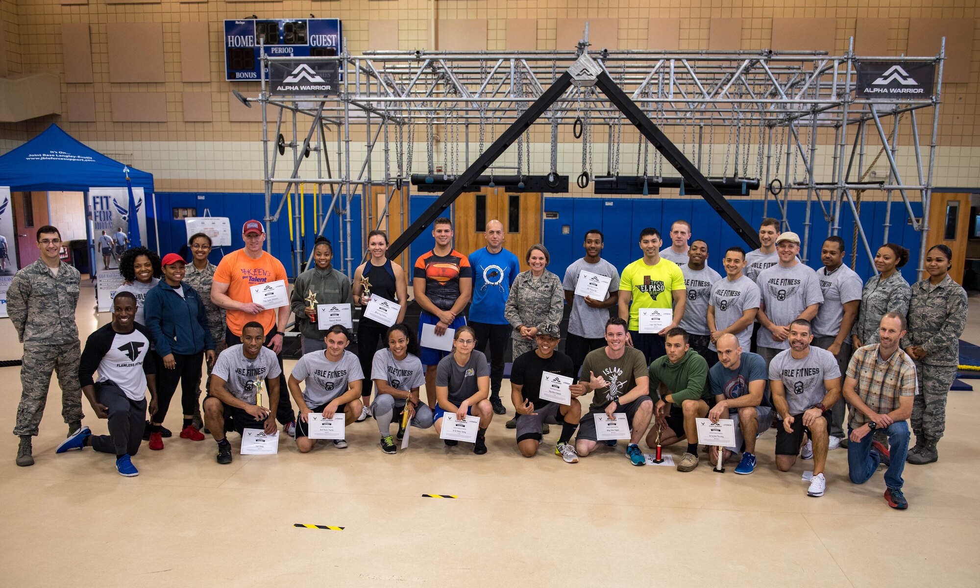 Staff and competitors pose for a group photo during the Alpha Warrior Northeast Regional Competition at Joint Base Langley-Eustis, Virginia, Oct. 13, 2018.