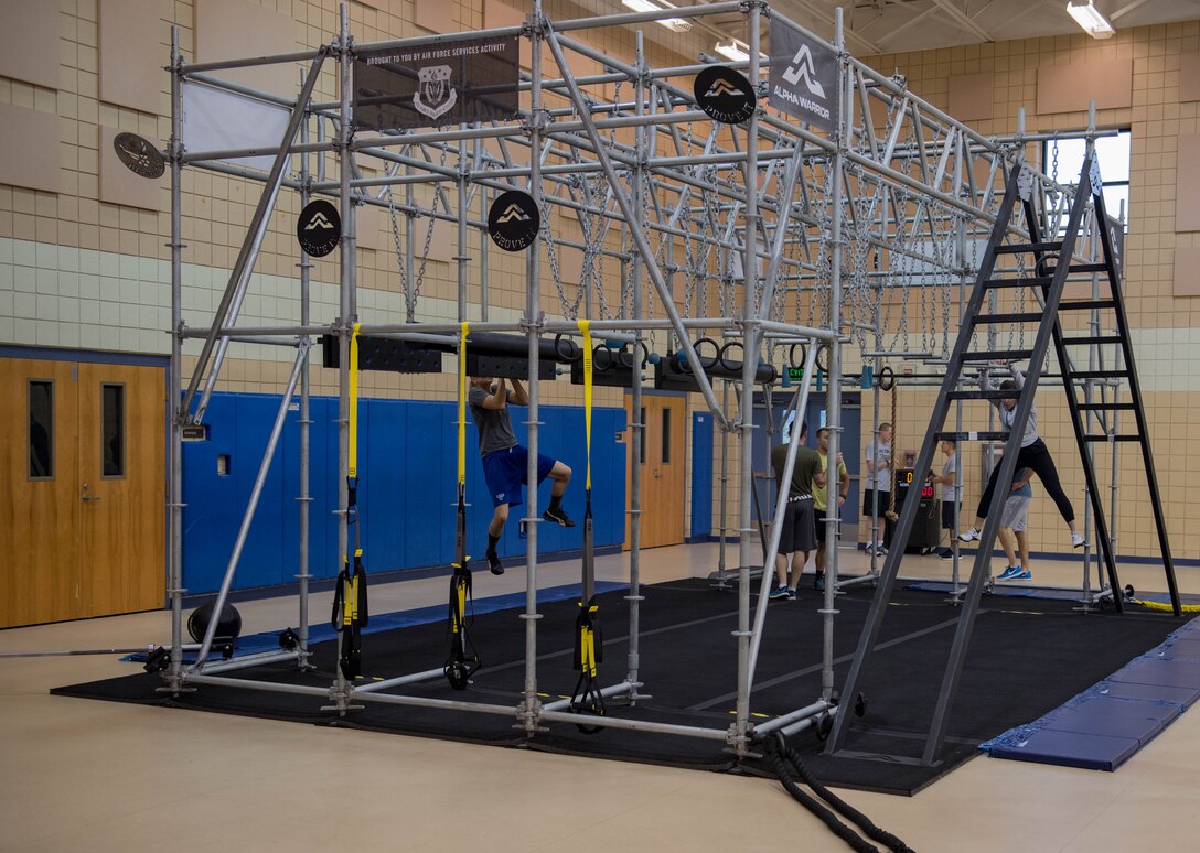 Competitors warm up on the Battle Rig during the Alpha Warrior Northeast Regional Competition at Joint Base Langley-Eustis, Virginia, Oct. 13, 2018.