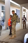 Sgt. Fraicor Terrero, a heavy vehicle driver assigned to Company A, 53rd Brigade Support Battalion, provides security to an American Red Cross shelter in Panama City, Fla, Oct. 15, 2018.