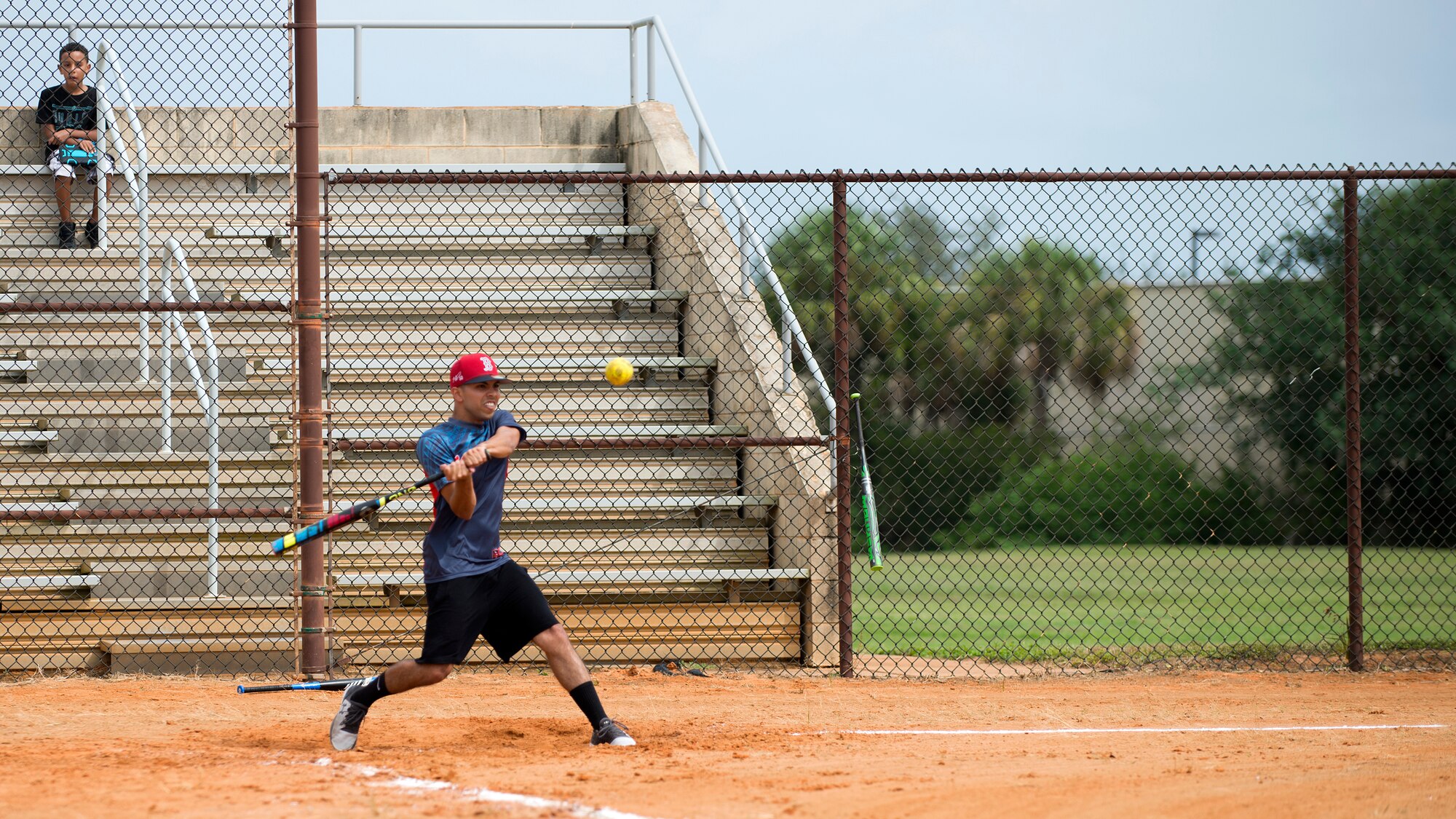 A 6th Civil Engineer Squadron fire protection Airmen swings a bat at MacDill Air Force Base, Fla., Oct. 10, 2018.