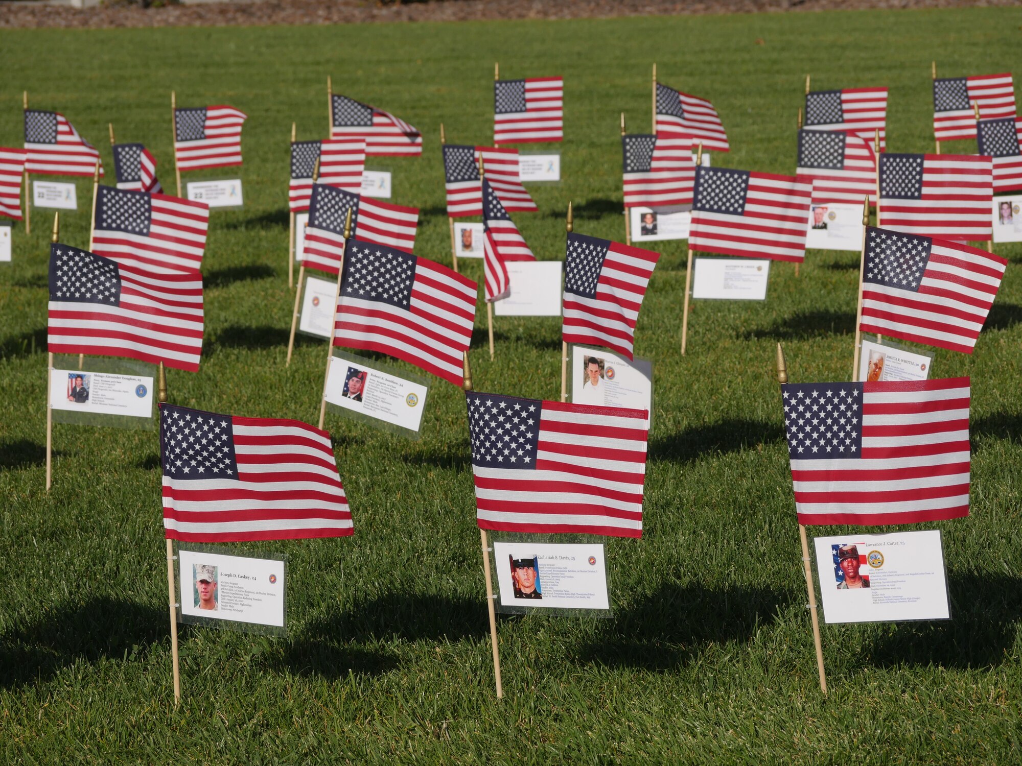 More than 760 American flags affixed with information of fallen California service members are displayed at the Sacramento Valley National Cemetery in Dixon, Calif., Oct. 13, 2018. The event consists of a 150-mile run through 23 towns. At every mile, runners placed American flags, known as ‘hero markers,’ in the ground to honor California service members who made the ultimate sacrifice since 9/11. (Courtesy Photo)