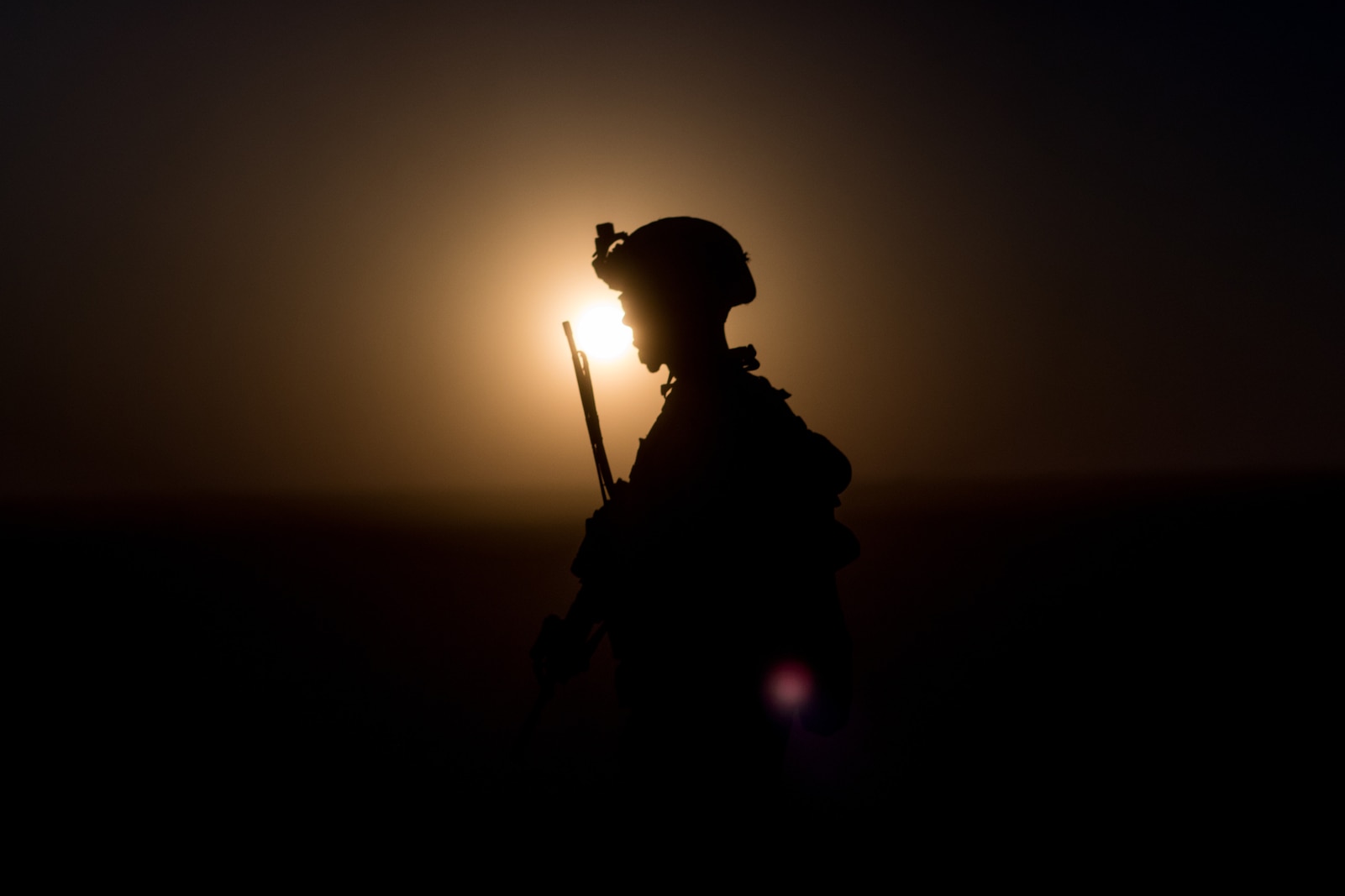 SOUTHWEST ASIA – A U.S. Marines with 3rd Battalion, 7th Marine Regiment, attached to Special Purpose Marine Air-Ground Task Force, Crisis Response-Central Command, prepares to board an MV-22 Osprey at a site near At-Tanf Garrison, Syria, Sept. 7, 2018. SPMAGTF-CR-CC Marines supported Special Operations Joint Task Force – Operation Inherent Resolve, conducting live-fire demonstrations showcasing the unit’s crisis response capabilities.  (U.S. Marine Corps photo by Cpl. Carlos Lopez)