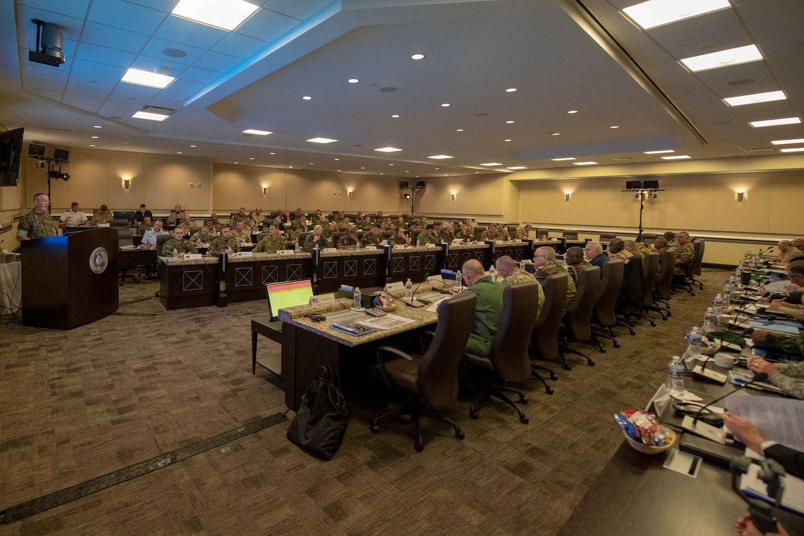 Chairman of the Joint Chiefs of Staff Gen. Joe Dunford delivers his opening remarks during the third Chiefs of Defense Conference he has hosted to counter violent extremist organizations at the Joint Base Andrews' Smart Center in Maryland.