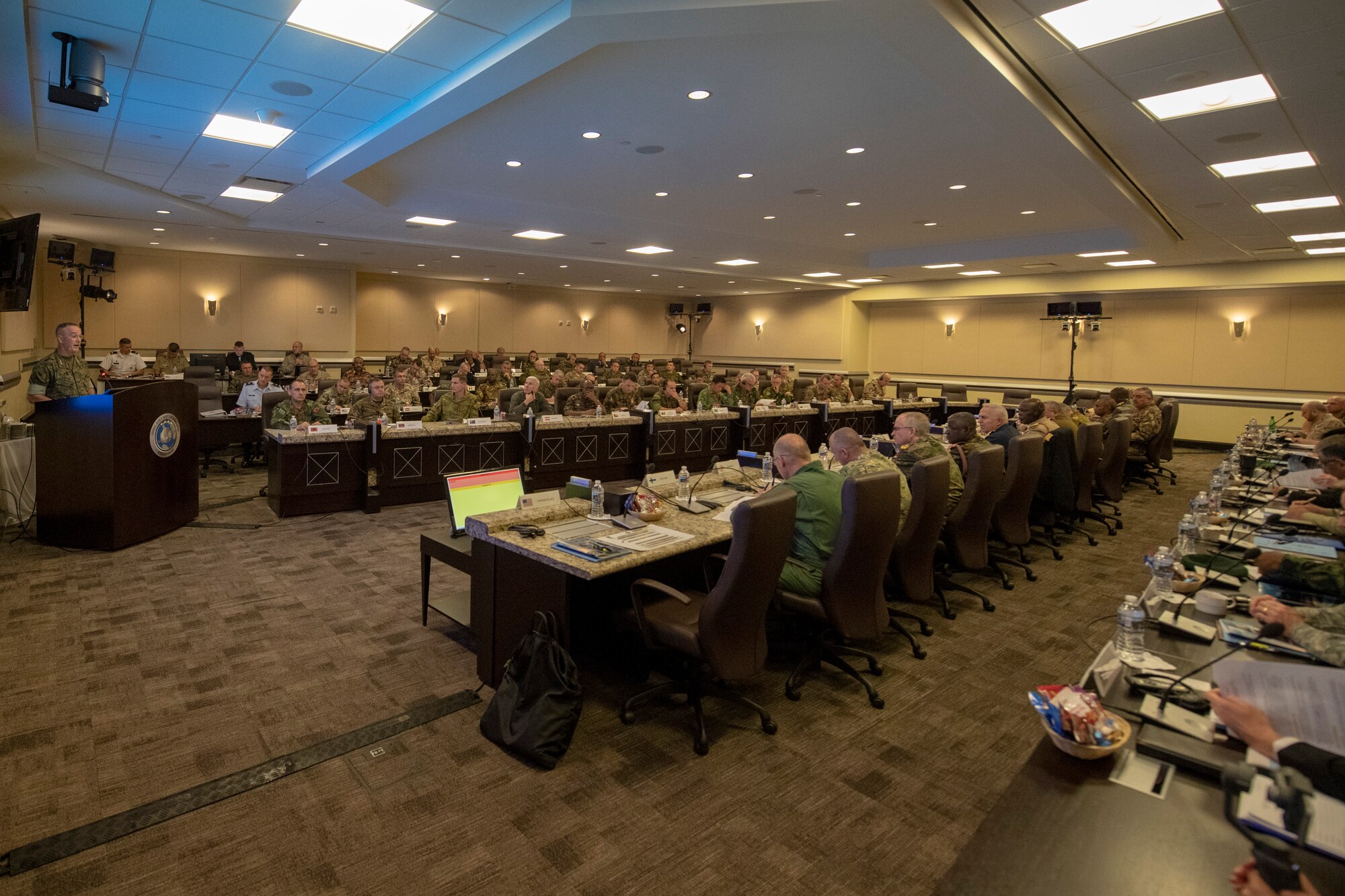 Chairman of the Joint Chiefs of Staff Gen. Joe Dunford delivers his opening remarks during the third Chiefs of Defense Conference he has hosted to counter violent extremist organizations at the Joint Base Andrews' Smart Center in Maryland.