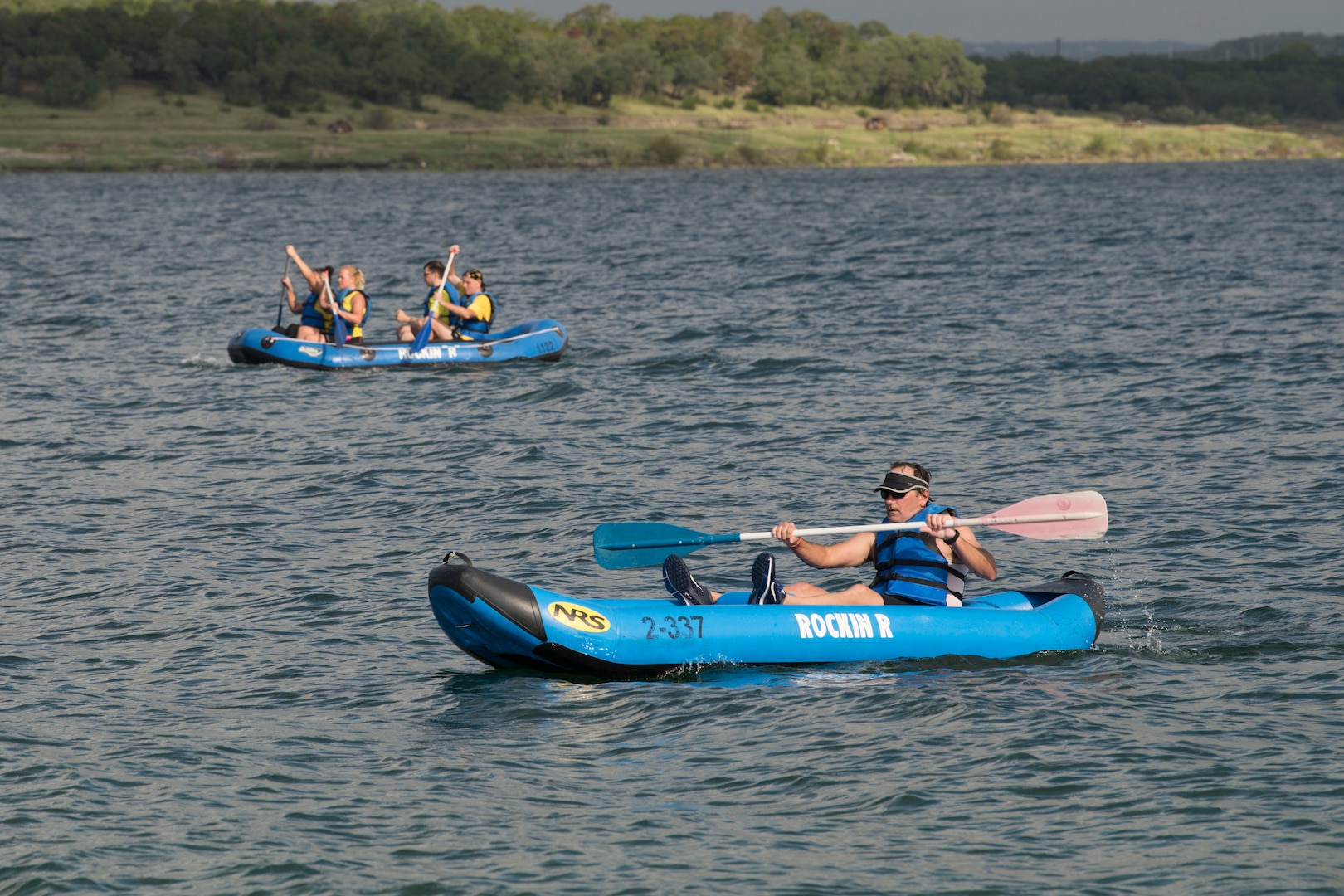 Participants in the Rambler 120 raft two miles as part of the triathlon Oct. 13, 2018, at Joint Base San Antonio Recreation Area at Canyon Lake, Texas.