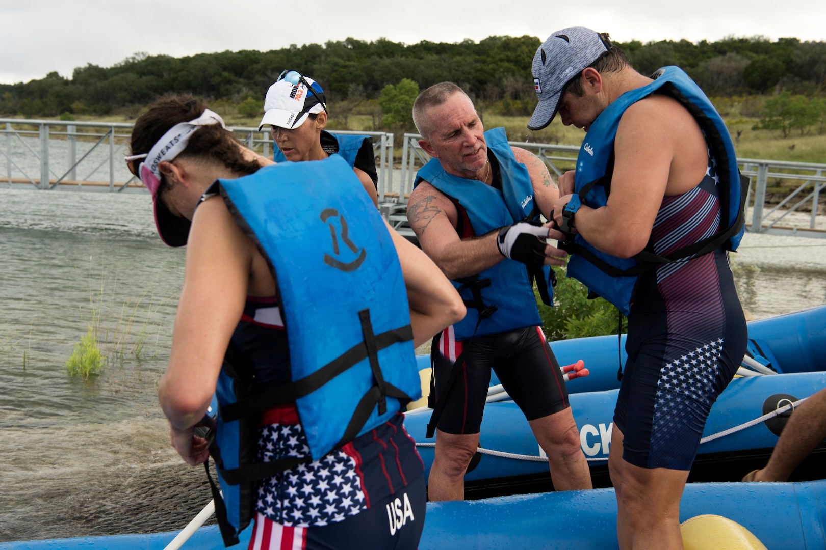 Members of Joint Base San Antonio prepare for the rafting portion of the Rambler 120 Oct. 13, 2018, at JBSA Recreation Area at Canyon Lake, Texas.