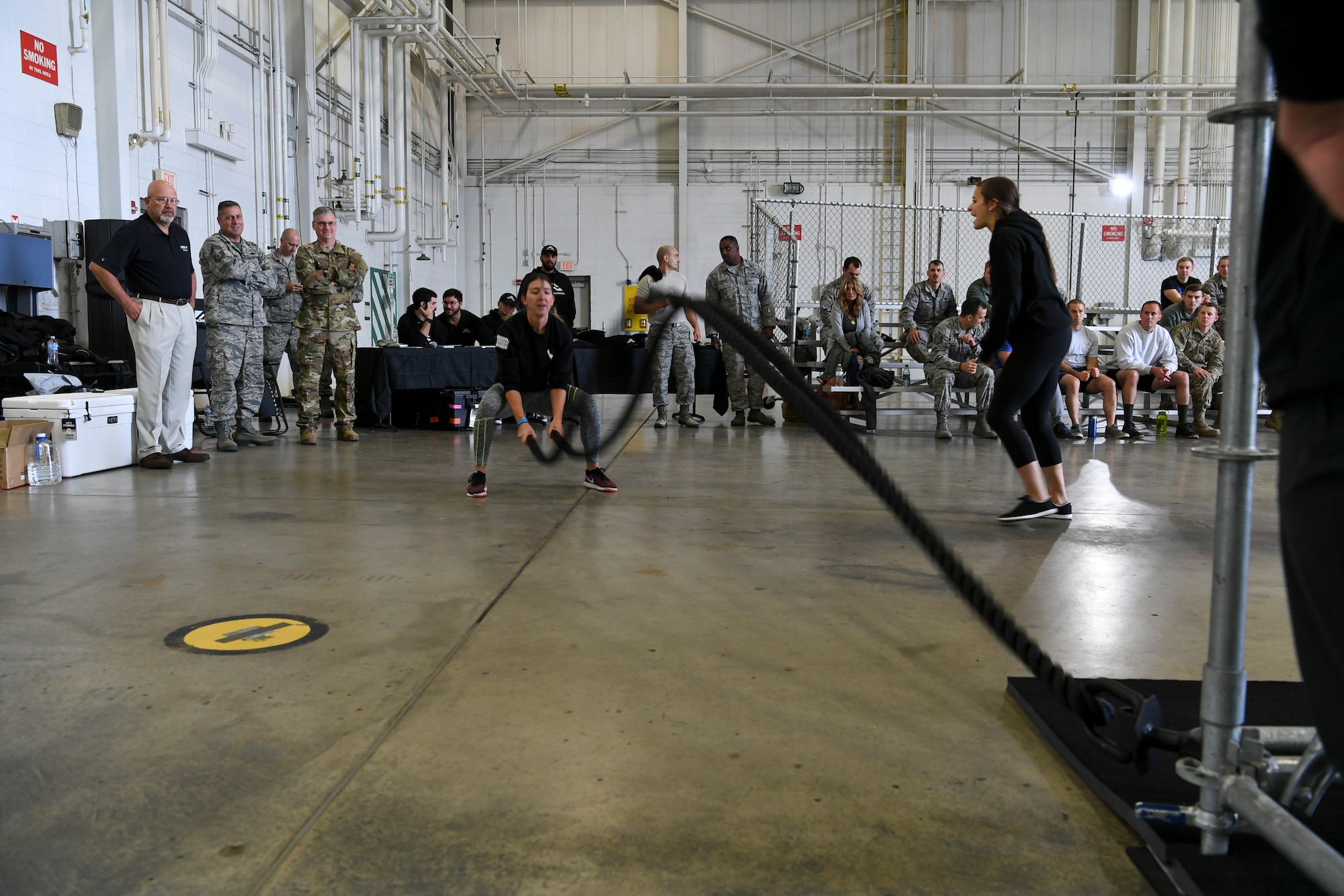 An Airman with the 911th Airlift Wing participates in a time challenge using the Alpha Warrior Battle Rig at the Pittsburgh International Airport Air Reserve Station, Pennsylvania, October 14, 2018. The battle rig is designed to meet all four of the Comprehensive Airman Fitness model's pillars: mental, physical, social and spiritual. (U.S. Air Force photo by Staff Sgt. Zachary Vucic)