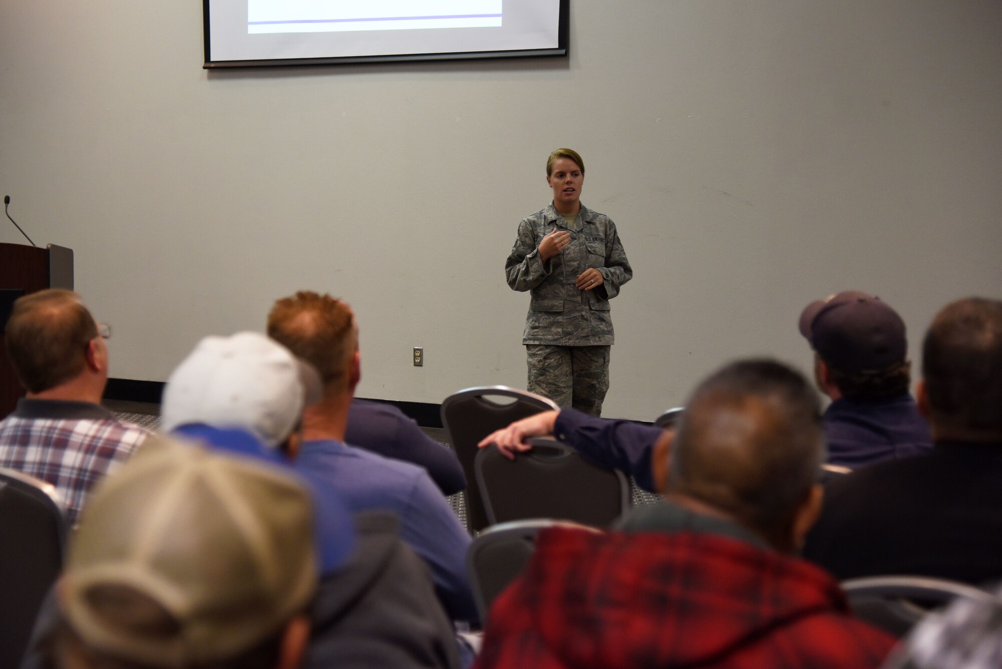 U.S. Air Force Senior Airman Therese Holm, 17th Medical Operations Squadron Mental Health certified alcohol and drug counselor, speaks during the National Disability Employment Awareness Month info fair at the Event Center on Goodfellow Air Force Base, Texas, Oct. 17, 2018. Holm provided information on what services are available to civilians who want to visit mental health. (U.S. Air Force photo by Staff Sgt. Joshua Edwards/Released)