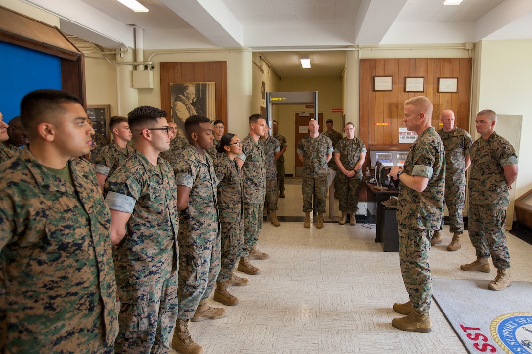 U.S. Marine Corps Brig. Gen. Paul J. Rock Jr., commanding general, Marine Corps Installations Pacific, speaks to U.S. Marines with Legal Services Support Team at the legal building during his visit to Marine Corps Base Hawaii, Oct. 15, 2018. From being MCIPAC's meritorious sergeant nominee to Hawaii's USO service member of the year, Rock recognized four Marines then sat down and enjoyed chow with them and along other MCBH Marines. (U.S. Marine Corps photo by Sgt. Zachary Orr)