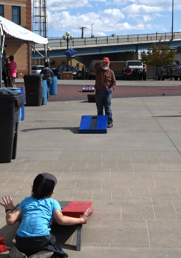 Local community members play cornhole during the first county-wide Fire Prevention Week Open House in Cheyenne, Wyo., on Oct. 13, 2018. The local community enjoys the festivities during the Fire Prevention Week Open House.