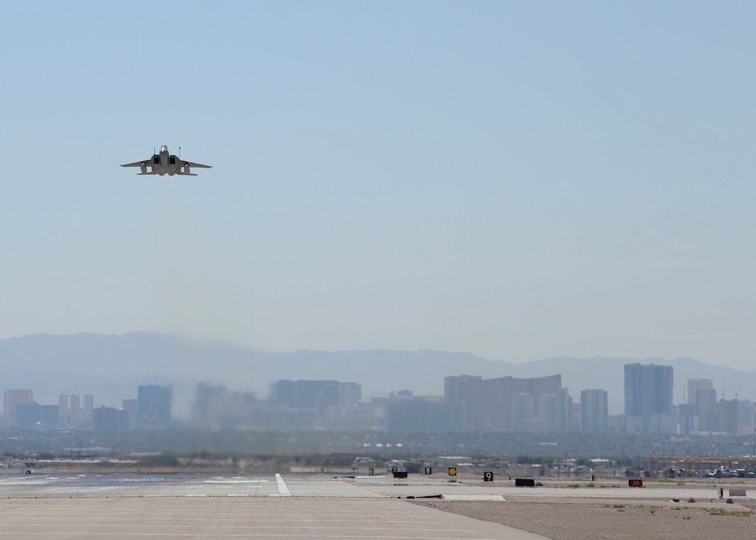An F-15 Eagle fighter jet takes off from the flightline on Nellis Air Force Base, Nev., Sept. 26, 2018.