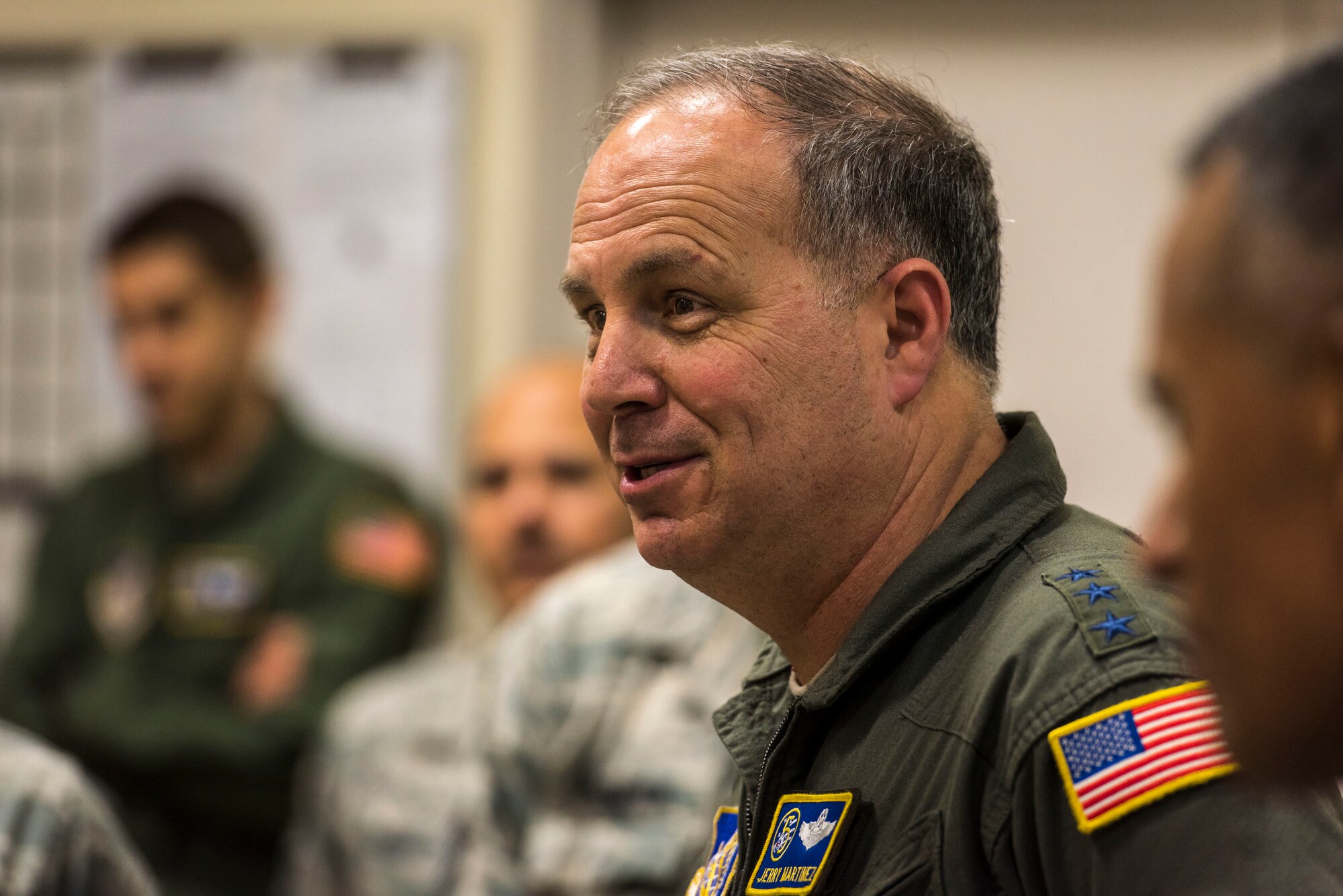 U.S. Air Force Lt. Gen. Jerry P. Martinez, the U.S. Forces Japan and Fifth Air Force commander, engages with aircraft structural maintenance Airmen during his visit at Misawa Air Base, Japan, Oct. 11, 2018. The general’s visit down-to-earth conversations with Airmen from across the installation allowing him an opportunity to hear their stories and communicate with them in a one-on-one manner. (U.S. Air Force photo by Tech. Sgt. Benjamin W. Stratton)