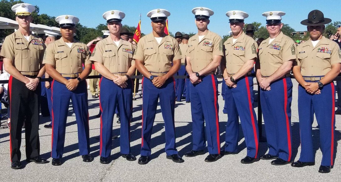 Brig. Gen. James F. Glynn, the commanding general of Eastern Recruiting Region and Marine Corps Recruit Depot Parris Island, S.C., attends a recruit graduation ceremony with sergeants major throughout ERR and 6th Marine Corps District, at MCRD Parris Island, Oct. 12, 2018. 

From left to right, the sergeants major are Sgt. Maj. Timothy O. Clay, Recruiting Station Atlanta; Sgt. Maj. Devlin Root, Recruiting Station Montgomery; Sgt. Maj. Cortez L. Brown, 6th Marine Corps District; Sgt. Maj. Joshua Figueredo, Recruiting Station Charlotte; Sgt. Maj. John D. Dober, Recruiting Station Fort Lauderdale; Sgt. Maj. Daniel D. Moore, Recruiting Station Columbia; and Sgt. Maj. Rafael Rodriguez, ERR and MCRD Parris Island.