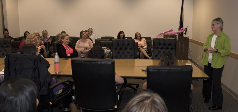 Michaelene Kloster, 99th Readiness Division chief of staff and retired U.S. Army brigadier general, speaks during a Breast Cancer Awareness Month seminar on Joint Base McGuire-Dix-Lakehurst, New Jersey, Oct. 11, 2018. Kloster, a breast cancer survivor, shared with the group her experience and the effects treatments had on her. (U.S. Air Force photo by Airman First Class Ariel Owings)