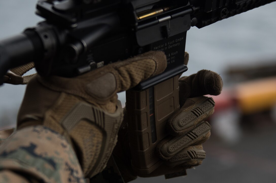 Lance Cpl. Ryan Beckstead, an rifleman with Company F, Battalion Landing Team, 2nd Battalion, 5th Marines, loads an M4 carbine during marksmanship training aboard the amphibious assault ship USS Wasp, underway in the East China Sea, Oct. 16, 2018. Beckstead, a native of Salt Lake City, Utah, graduated from Granger High School in May 2017; he enlisted November 2017. Company F, the helicopter-borne raid element with BLT 2/5, conducted this training to refine marksmanship skills during the fall patrol. The 31st Marine Expeditionary Unit, the Marine Corps’ only continuously forward-deployed MEU, provides a flexible force ready to perform a wide range of military operations.