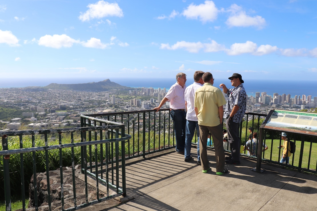 HONOLULU, Hawaii (Oct. 16, 2018) -- Honolulu District Environmental Branch Chief Michael Wong (center right) explains some of the nuances of the Ala Wai Watershed to USACE enterprise personnel during a field trip to the Ala Wai Charette hosted by Honolulu District included a site visit to Tantalus, Manoa Stream, Waiakeakua, Kanewai Field, Pukele Streams, and the Ala Wai Canal during the three-day Ala Wai Watershed Flood Mitigation Design Charrette