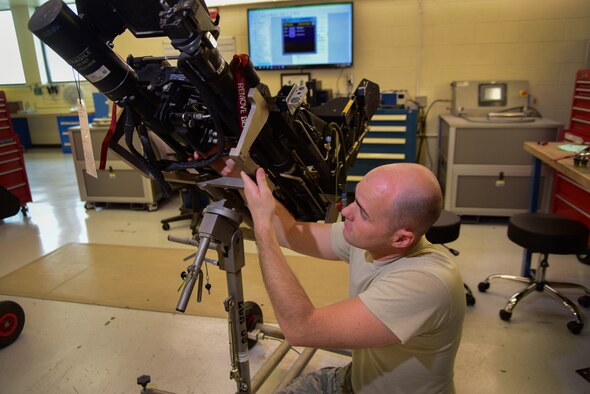 Staff Sgt. Kenneth Rambo, 47th Flying Training Wing egress systems craftsman, installs components on a pilot’s ejection seat, Oct. 10, 2018, at Laughlin Air Force Base, Texas. Along with their support and the dedication of his team, Rambo mentored the next generation of egress craftsmen, aced the Unit Effectiveness Inspection, or UEI, with zero discrepancies and earned the honor roll achievement to earn him the “XLer of the week” award. (U.S. Air Force photo by Airman 1st Class Marco A. Gomez)