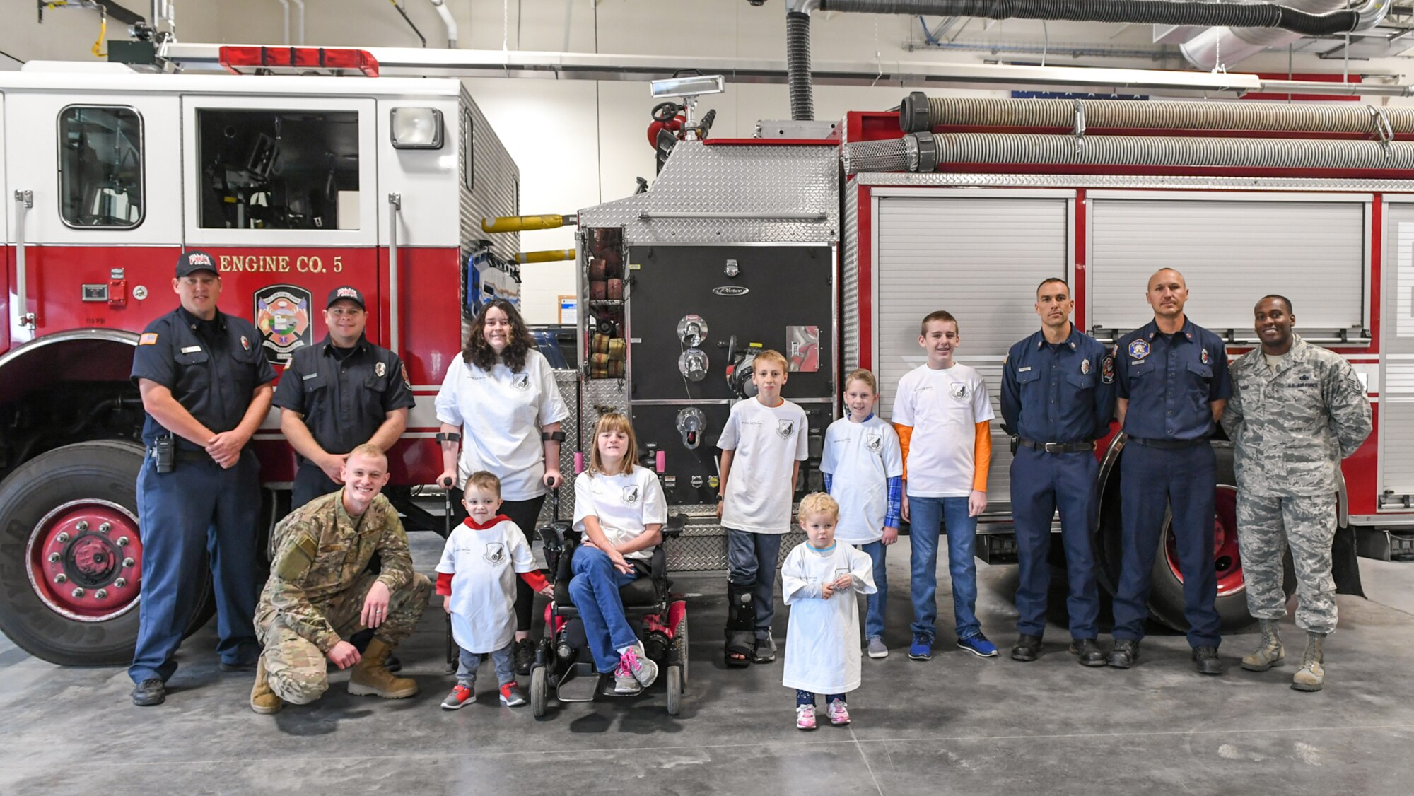 Make-A-Wish Utah children during a base tour Oct. 11, 2018, at Hill Air Force Base, Utah. During the tour, Make-A-Wish children and families visited with the 75th Air Base Wing’s fire department, explosive ordnance disposal unit, and military working dog team. (U.S. Air Force photo by Cynthia Griggs)