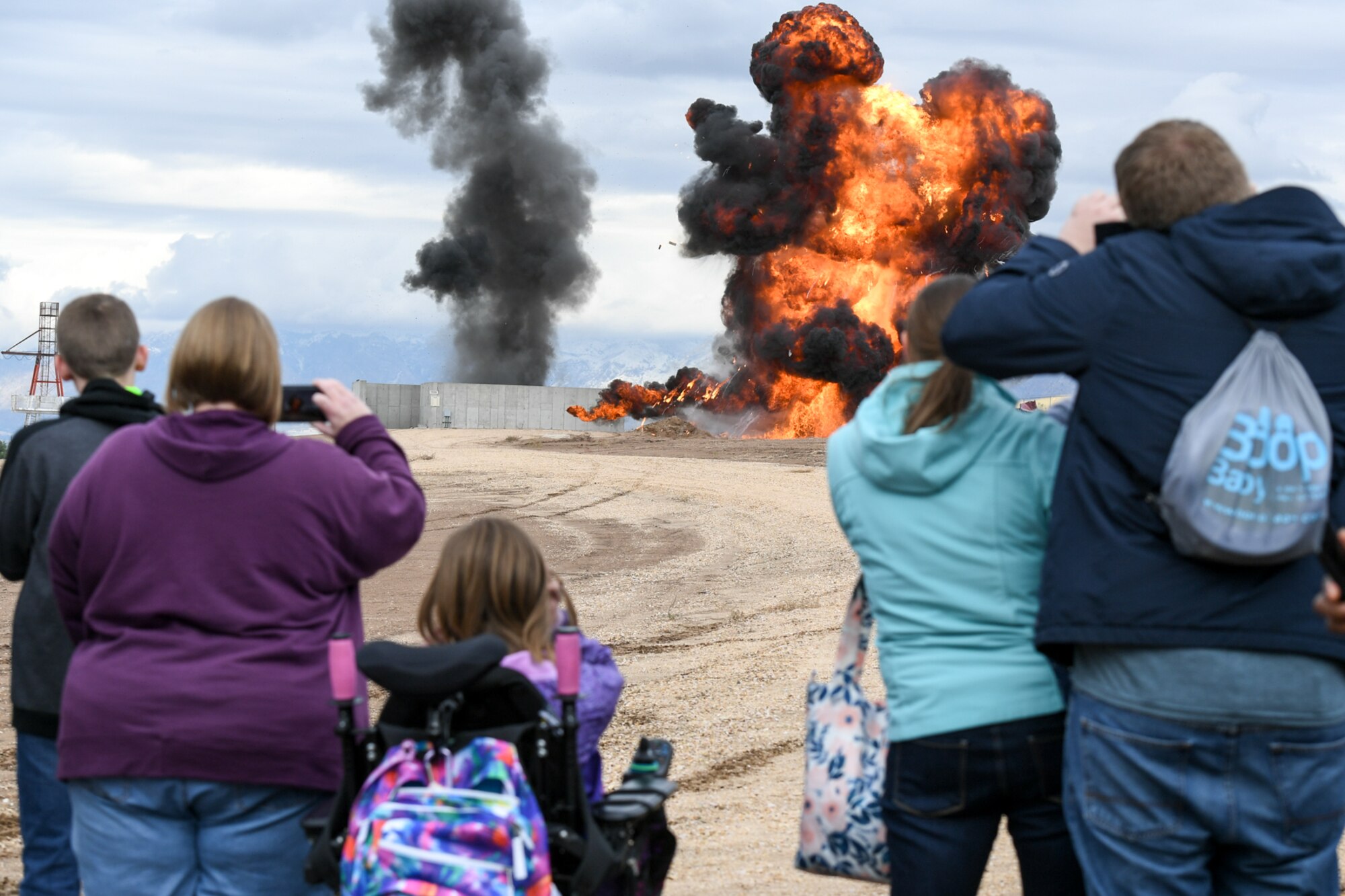 Make-A-Wish Utah children and families witness a controlled detonation during a visit to the 775th Explosive Ordinance Disposal Flight Oct. 11, 2018, at Hill Air Force Base Utah. The visit was part of a 75th Air Base Wing-hosted base tour for Make-A-Wish. (U.S. Air Force photo by Cynthia Griggs)