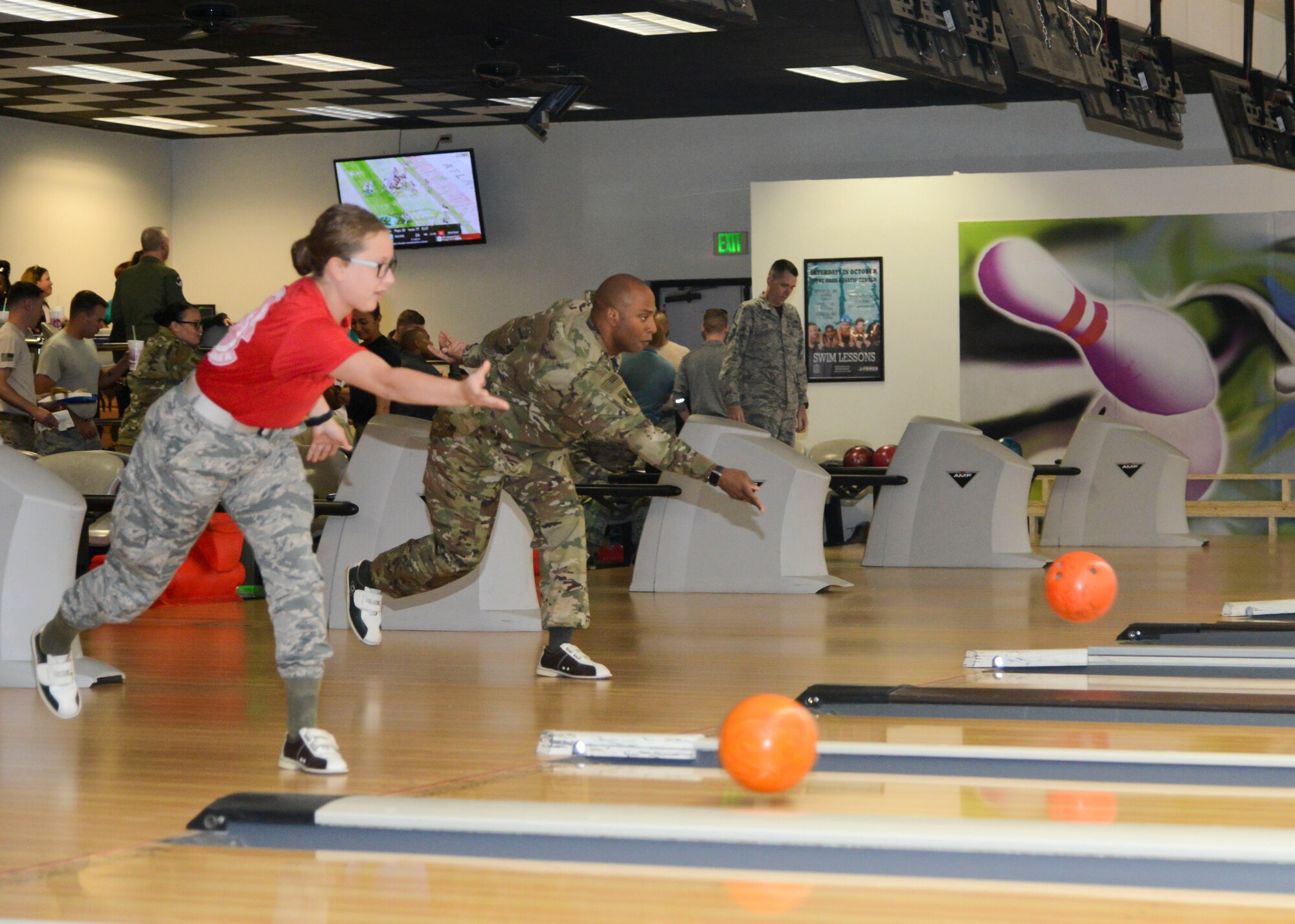Chief Master Sgt.  Roosevelt Jones, 412th Test Wing command chief master sergeant, bowls during the “Strike Out Sexual Assault” event at the High Desert Bowling Lanes on Edwards Air Force Base, California, Oct. 12. (U.S. Air Force photo by Giancarlo Casem)