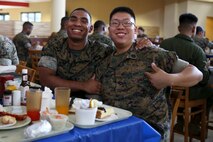 Lance Cpl. Christian Lozano (left) and RSPN Sunny Li pose for a picture during the Navy’s birthday celebration aboard Marine Corps Air Station Beaufort Oct. 17. Li is a religious program specialist with Marine Aircraft Group 31 and Lozano is a supply clerk with Headquarters and Headquarters Squadron aboard Marine Corps Air Station Beaufort.