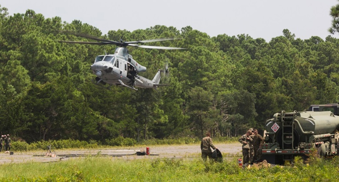 A U.S. Marine Corps UH-1Y Huey with Marine Light Attack Helicopter Squadron (HMLA) 167 arrives at a forward arming and refueling point (FARP) on Marine Corps Outlying Landing Field Atlantic, N.C., Aug. 14, 2018.
