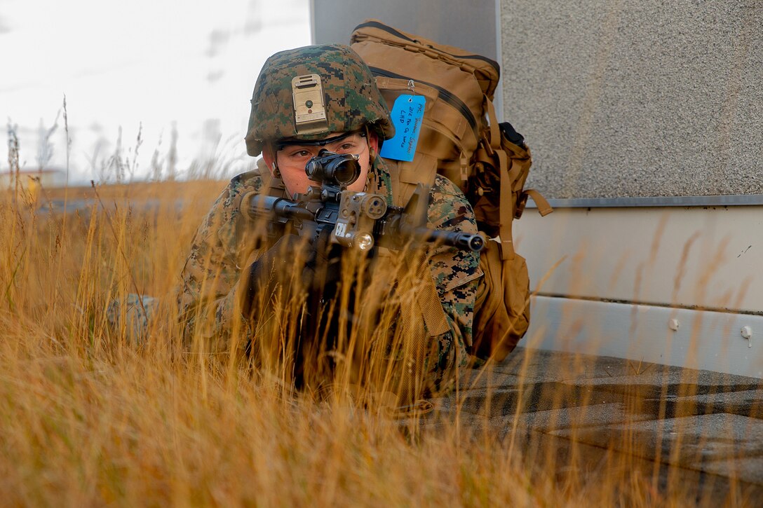 A Marine provides security for his team during Exercise Trident Juncture 18.