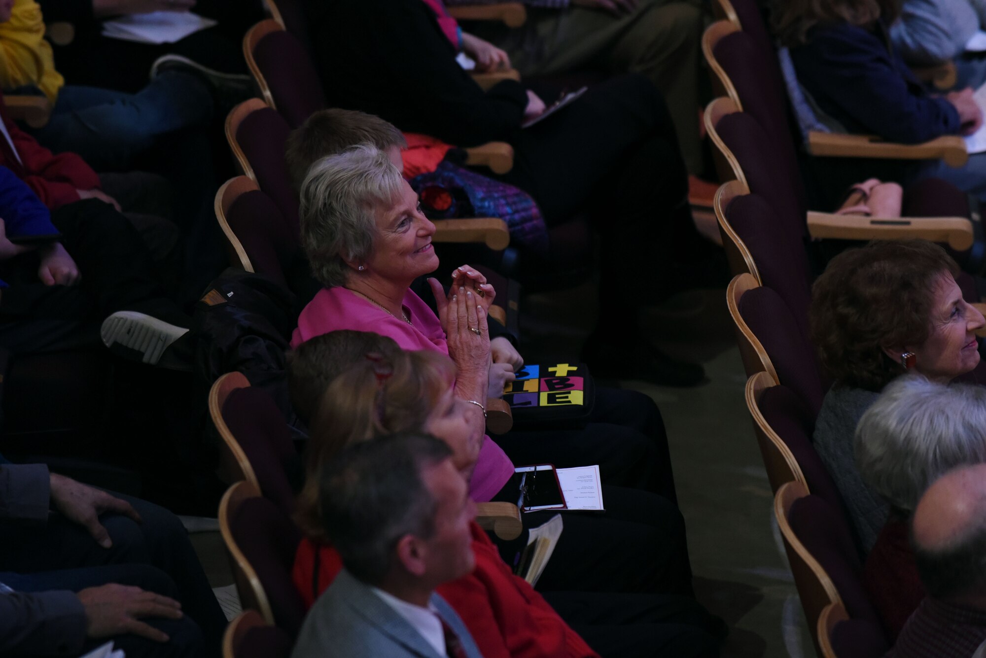 An audience member enjoys the performance by Offutt Brass at the Performing Arts Center’s Historic Theater in Rapid City, S.D., Oct. 14, 2018. The band played “Buckaroo Holiday,” several selections from “West Side Story,” “Blue Bells of Scotland,” and a number of patriotic songs. (U.S. Air Force photo by Airman Christina Bennett)