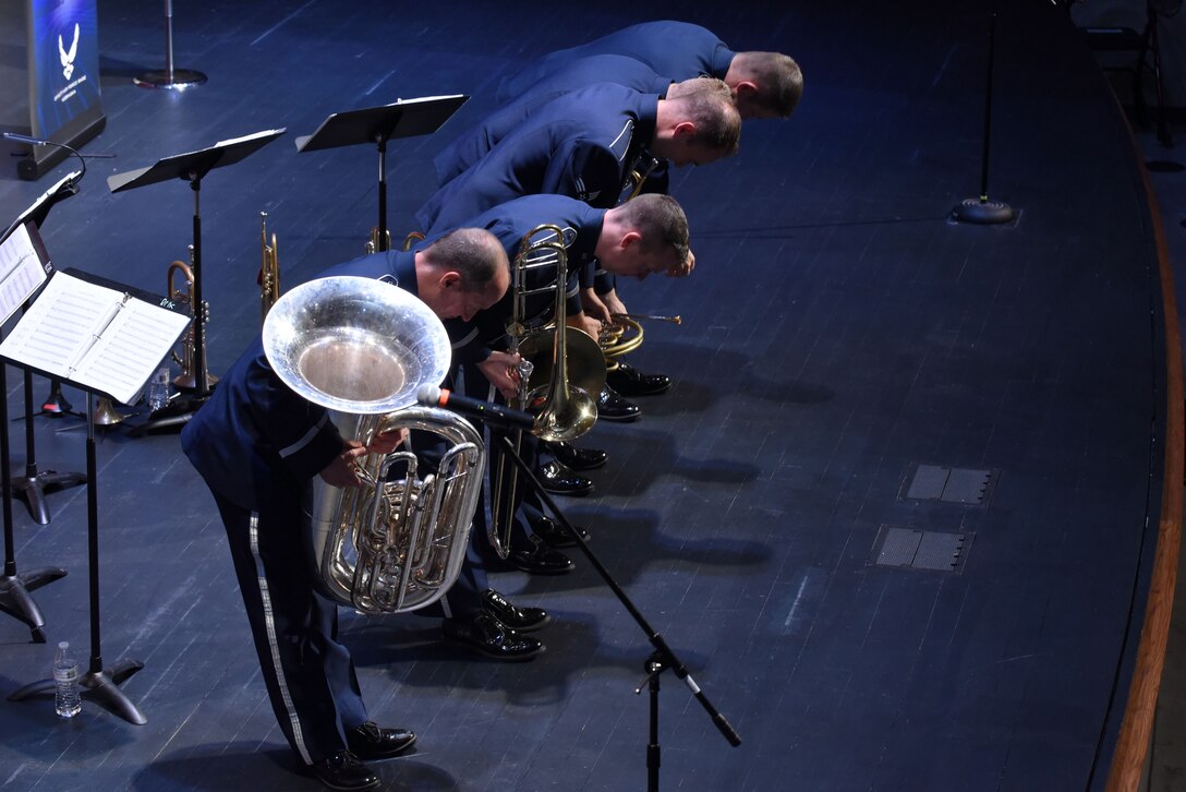 Offutt Brass, the United States Air Force Heartland of America Band’s brass ensemble, ends their performance at the Performing Arts Center’s Historic Theater in Rapid City, S.D., Oct. 14, 2018. The band played the “Armed Forces Salute” at the conclusion of the evening. The “Armed Forces Salute” pays tribute to each of the five military branches. (U.S. Air Force photo by Airman Christina Bennett)