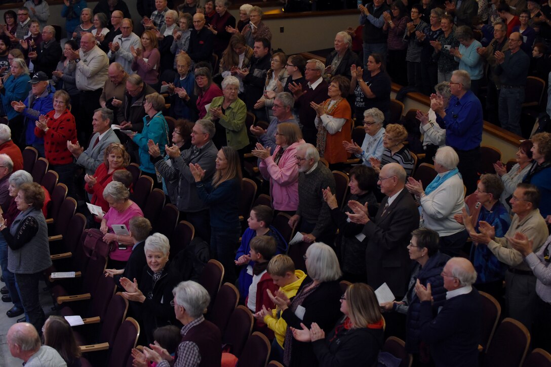 The audience gives Offutt Brass a standing ovation at the Performing Arts Center’s Historic Theater in Rapid City, S.D., Oct. 14, 2018. The audience was made up of many prior service members, spouses and their families from the Rapid City community. (U.S. Air Force photo by Airman Christina Bennett)