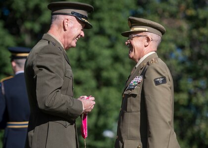 Marine Corps Gen. Joe Dunford, chairman of the Joint Chiefs of Staff, presents a Legion of Merit Award to Spain’s Chief of Defence Gen. Fernando Alejandre Martinez during an Armed Forces Full Honor Arrival Ceremony in Washington, D.C., Oct. 18, 2018.