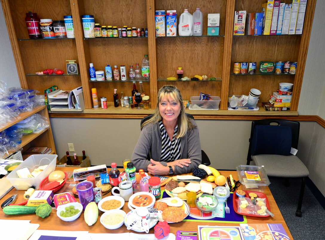 Geri Seal, the 28th Medical Operations Squadron health promotion program manager, meets with an average of 25 to 30 Airmen and beneficiaries a month to discuss their particular goals for living a healthier lifestyle. Seal provides them with resources, such as a calendar of workouts she conducts weekly, one-on-one meetings and healthy eating classes. (U.S. Air Force photo by Senior Airman Denise M. Jenson)