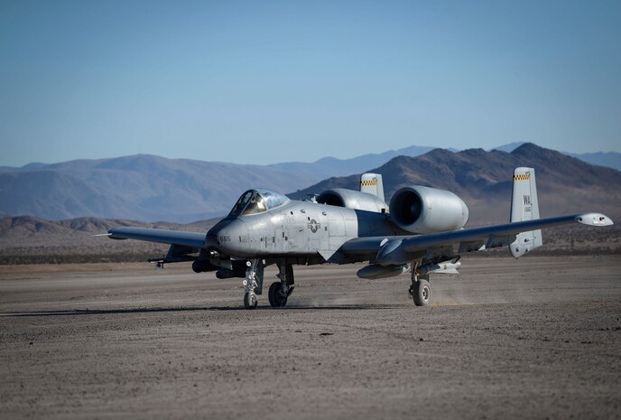 An A-10 Thunderbolt II assigned to the 66th Weapons School (WPS) at Nellis Air Force Base, Nevada, prepares for takeoff Oct. 5, 2018 at Ft. Irwin, California. The 66th WPS Weapons Instructor Course pilots flew as forward air control in support of Green Flag West 19-01 held at Ft Irwin. (U.S. Air Force photo by Airman Bailee A. Darbasie)