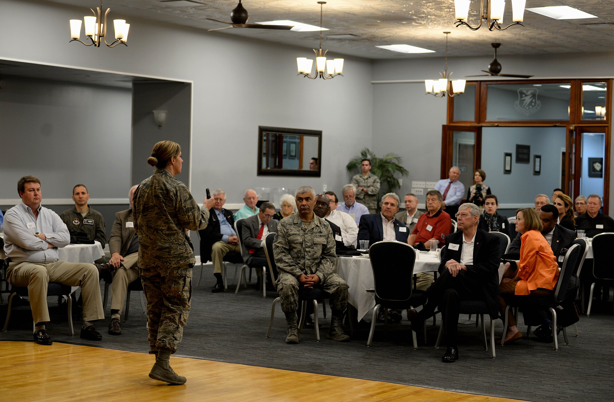 Col. Samantha Weeks, 14th Flying Training Wing Commander, talks to Base Community Council members and Airmen Oct. 11, 2018, during a BCC luncheon at the Club on Columbus Air Force Base, Mississippi. Weeks gave some background information on who she is and explained the new wing mission statement and what it means. (U.S. Air Force photo by Airman Hannah Bean)