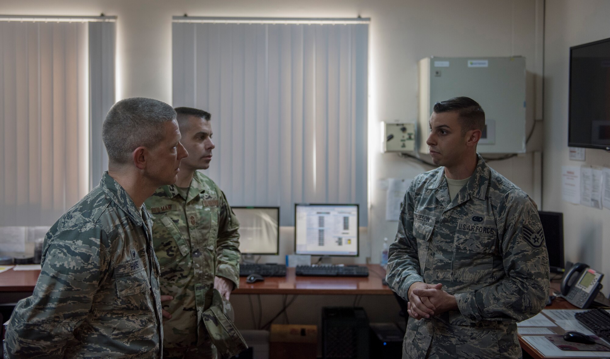 A 39th Logistics Readiness Squadron fuels service center controller briefs the 39th Air Base Wing commander and command chief.