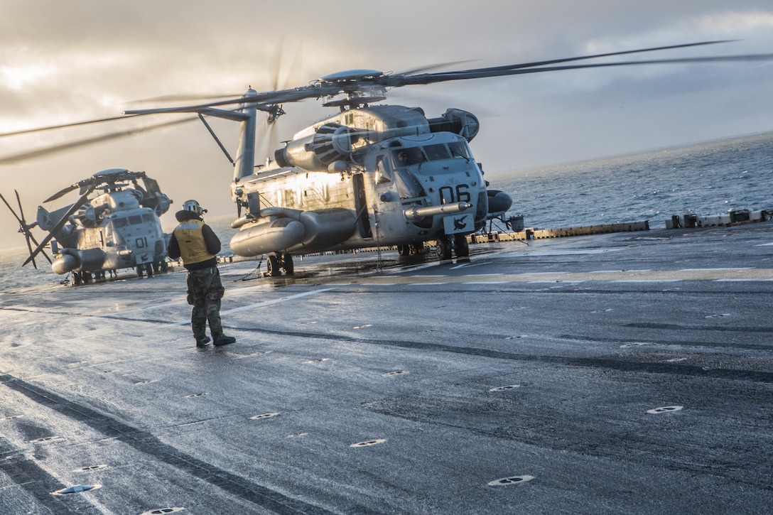 A U.S. Marine Corps CH-53 Sea Stallion prepare for takeoff aboard USS Iwo Jima Oct 17, in preparation of Exercise Trident Juncture 2018. Trident Juncture is a planned exercise to enhance U.S. and NATO partners' and Allies' ability to work together collectively and conduct military operations under challenging conditions.