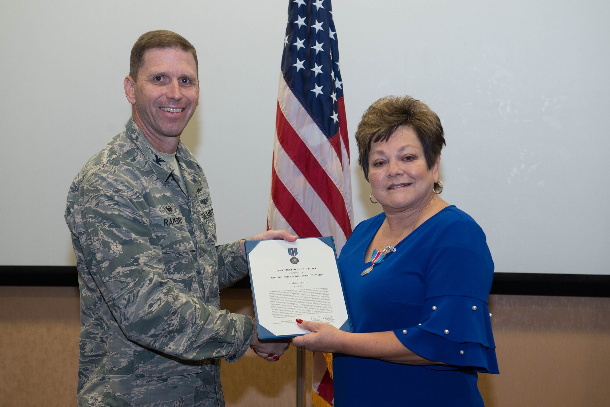 55th CS Honorary Commander receives award