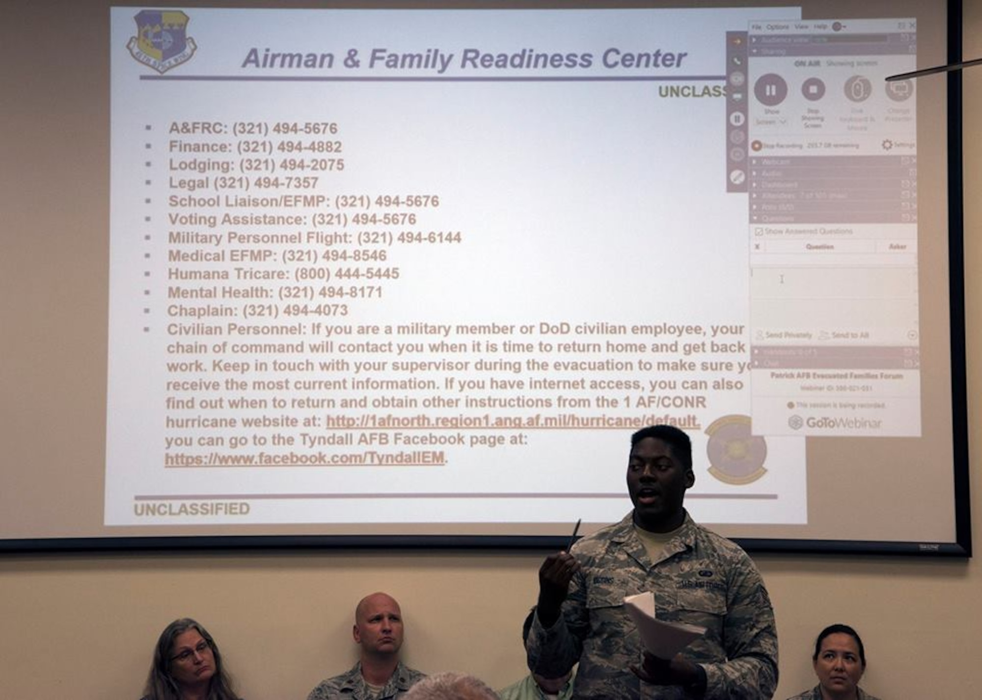 Senior Airman Willis Riggins, 45th Comptroller Squadron representative, briefs Tyndall Air Force Base, Fla. families on finance during an Emergency Family Assistance Center at Patrick Air Force Base, Fla. on Oct. 17, 2018. The EFAC provided a forum to connect Tyndall AFB families displaced by Hurricane Michael with Patrick AFB agencies.