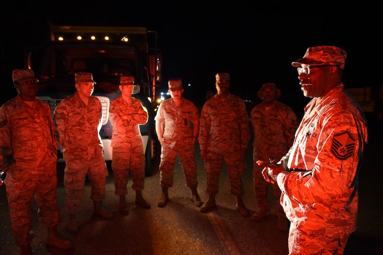 Master Sgt. Terry Kelly, a civil engineering operations manager, addresses Airmen assigned to the 165th Airlift Wing before returning to relief operations for Hurricane Michael in Seminole County, Ga., Oct. 14, 2018. The Georgia Air National Guard is working with the Georgia Emergency Management Agency and local authorities to conduct route clearance and debris removal. (U.S. Air National Guard photo by Tech. Sgt. Amber Williams)