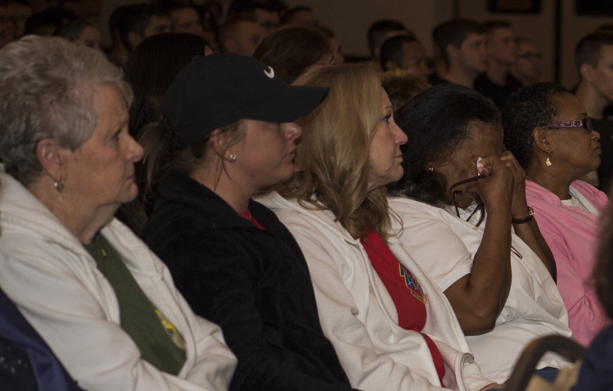 Members of Gold Star Families for Peace watch a video during the 12th Annual Gold Star Ruck March on Joint Base McGuire-Dix-Lakehurst, New Jersey, Oct. 6, 2018. Gold Star Families for Peace give families of military members who lost their lives during service the opportunity come together and celebrate their loved ones. (U.S. Air Force photo by Airman Ariel Owings)