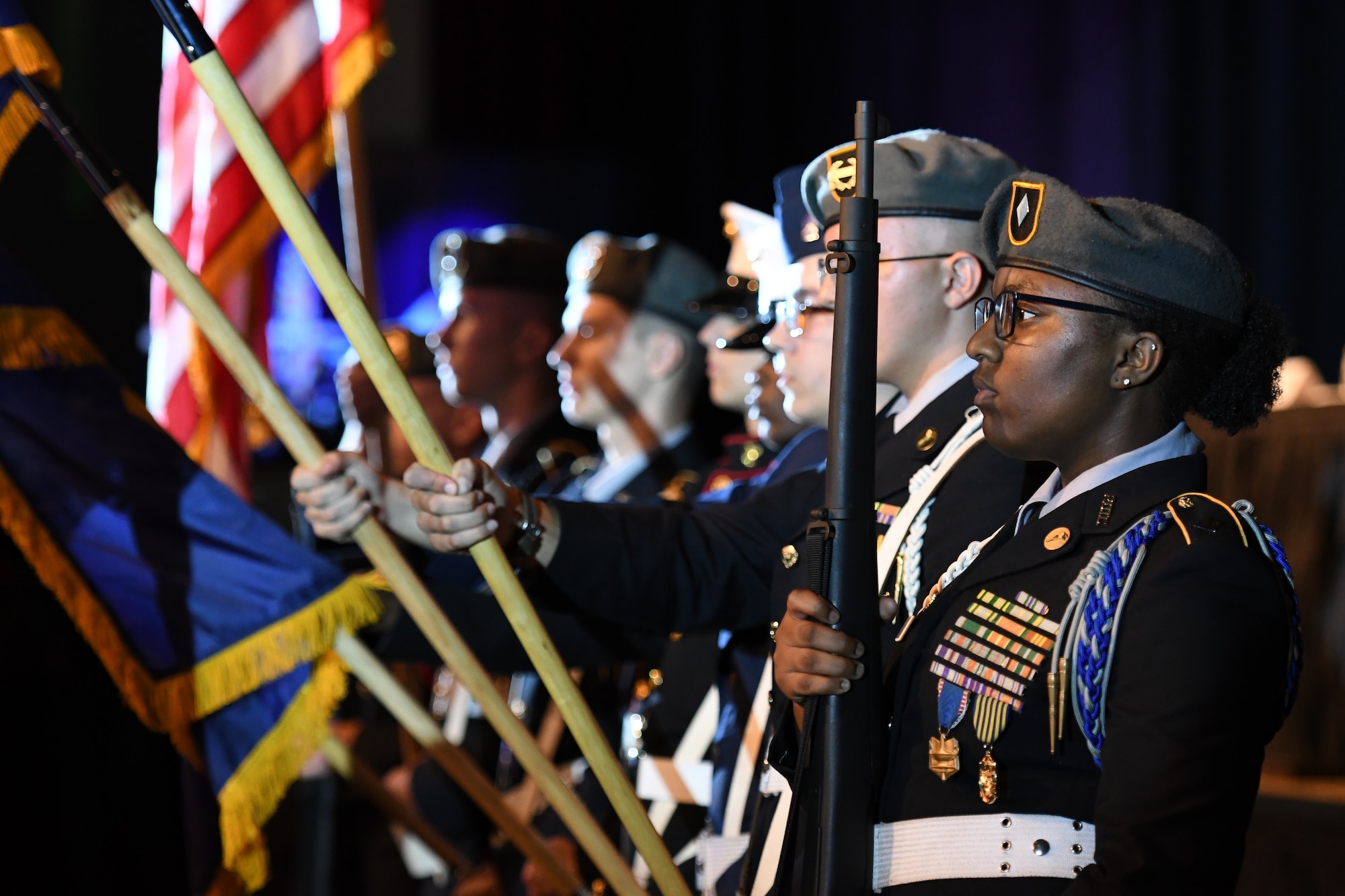 Joint Service-Junior ROTC cadets from local high schools present the colors during the 40th Annual Salute to the Military inside the Mississippi Coast Convention Center, in Biloxi, Mississippi, Oct. 16, 2018. The Salute to the Military event recognized the men and women who serve in the military along the Gulf Coast. (U.S. Air Force photo by Kemberly Groue)