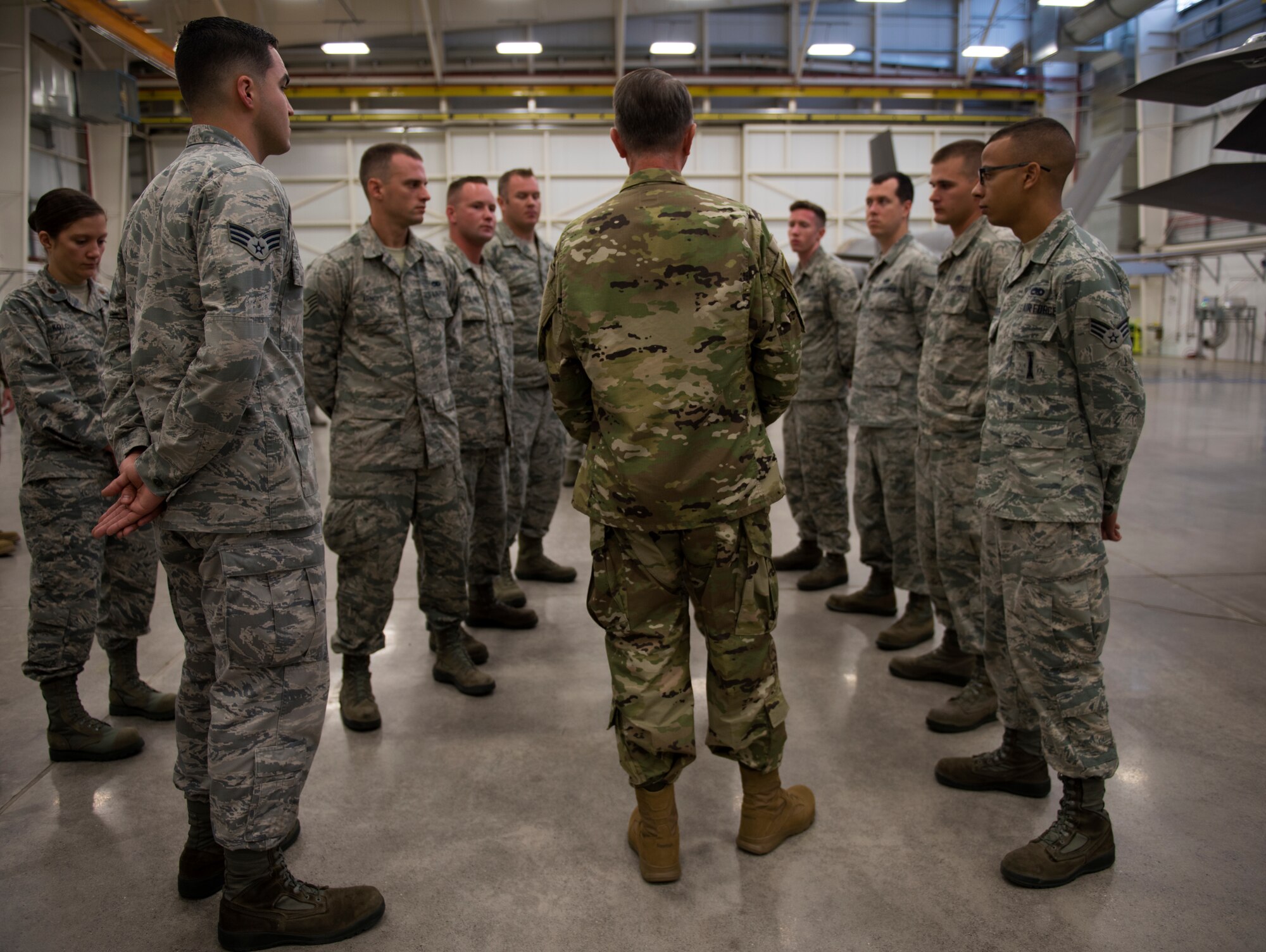 Lt. Gen. Warren D. Berry, deputy chief of staff of the Air Force for Logistics, Engineering and Force Protection, speaks with 56th Maintenance Group Airmen during a visit to evaluate innovative integrated maintenance technician programs Oct. 4, 2018, at Luke Air Force Base, Ariz. Berry discussed the programs, and ongoing evaluations for potential adoption of these programs Air Force-wide. (U.S. Air Force photo by Senior Airman Ridge Shan)
