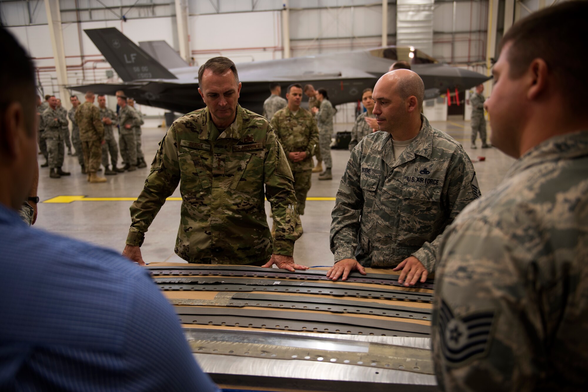 Lt. Gen. Warren D. Berry, Air Force deputy chief of staff for Logistics, Engineering and Force Protection, examines aircraft components produced in-house by some of Luke Air Force Base’s tenant units, Oct. 4, 2018, in Ariz. Berry’s visit laid out plans for the evaluation of several F-35 Lightning II maintenance programs which may enhance productivity and maintenance efficiency Air Force-wide. (U.S. Air Force photo by Senior Airman Ridge Shan)