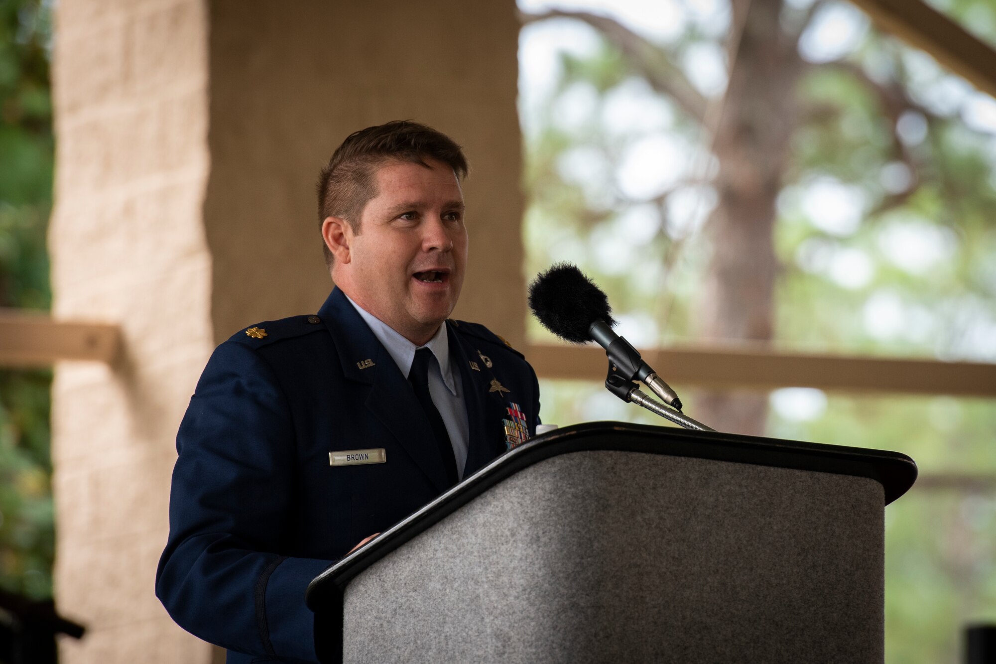 Maj. Gabriel Brown, director of operations with the Special Tactics Training Squadron, gives remarks during Chief Master Sgt. Michael West’s retirement ceremony at Hurlburt Field, Florida, Oct. 19, 2018.