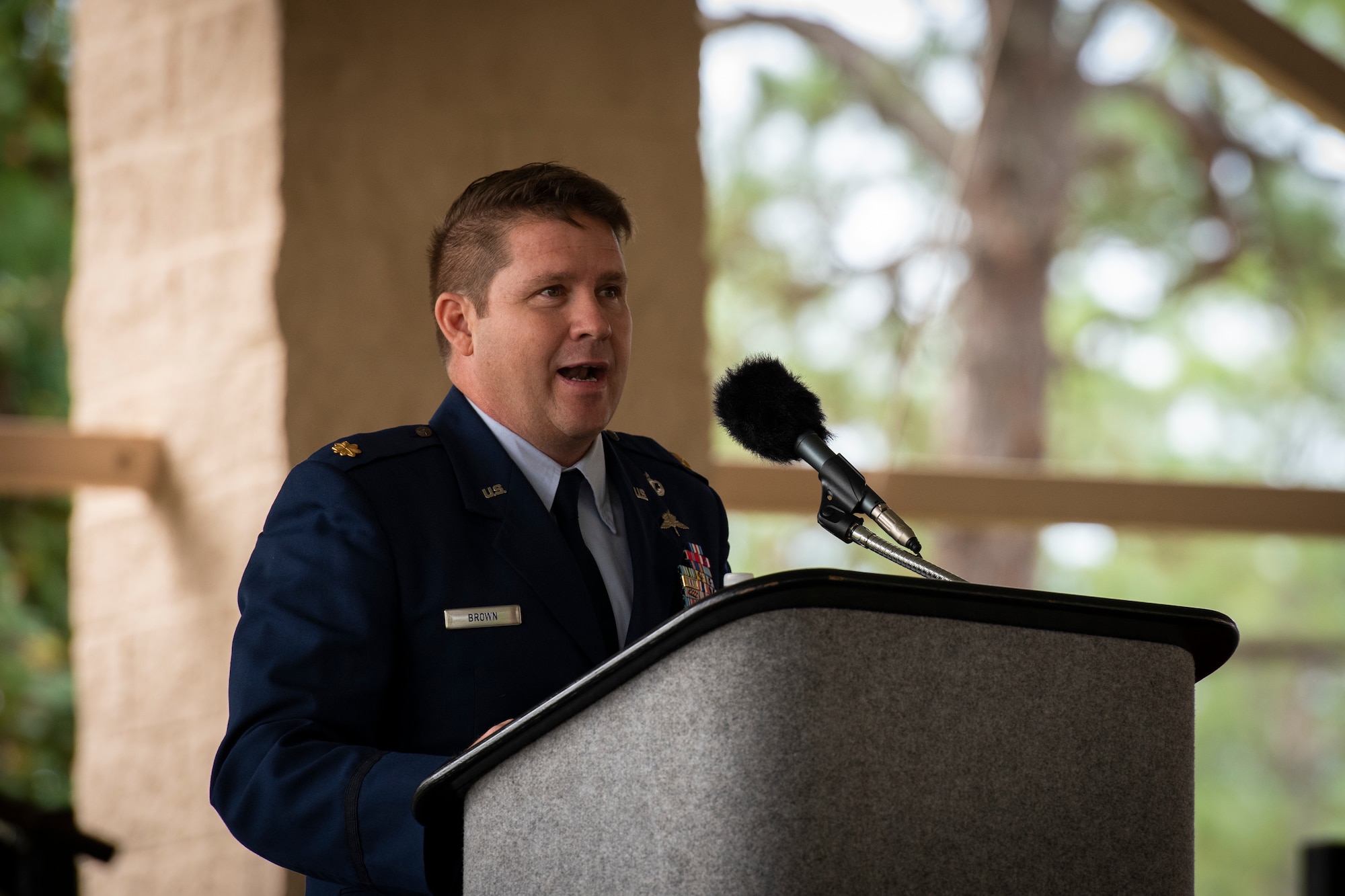 Maj. Gabriel Brown, director of operations with the Special Tactics Training Squadron, gives remarks during Chief Master Sgt. Michael West’s retirement ceremony at Hurlburt Field, Florida, Oct. 19, 2018.