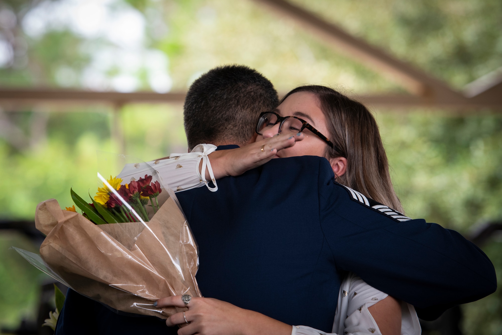 Chief Master Sgt. Michael West, left, a special tactics combat controller with the 24th Special Operations Wing, hugs his daughter during a retirement ceremony at Hurlburt Field, Florida, Oct. 19, 2018.