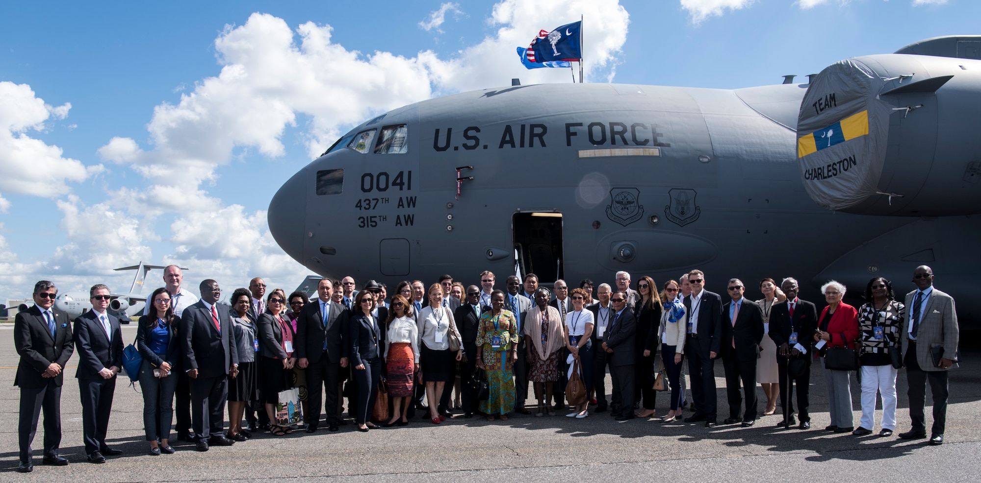 More than 30 foreign ambassadors and their spouses stand in front of a C-17 Globemaster III during their Experience America trip Oct. 15, 2018, at Joint Base Charleston. Hosting the ambassadors allowed JB Charleston to showcase its warfighting capabilities and assets, while also building relations with key representatives from around the globe.