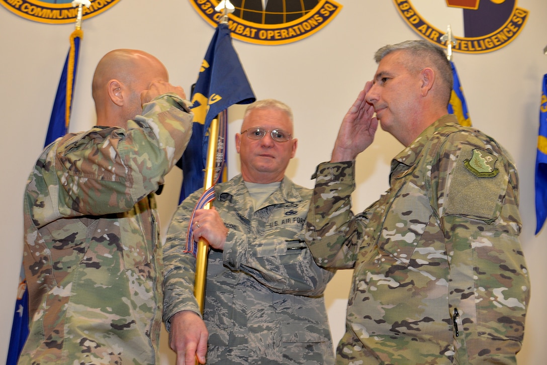 Col. Scott Harron (right), 193rd Air Operations Group commander, is appointed commander of the group Oct. 18, 2018, by Col. Terrence Koudelka (left), 193rd Special Operations Wing commander, during an assumption of command ceremony at the AOG, a unit of the wing located next to the airport in State College, Pa. Before taking on the role as AOG commander, Harron served as the 25th Air Force Inspector General, and as Inspection Team Chief at Air Combat Command headquarters. He also served as commander of the 152nd Air Intelligence Squadron at Hancock Field Air National Guard Base, Mattydale, N.Y. "Scott is the absolute perfect person for this position. His intel experience and track record of deployments is nothing short of impressive," Koudelka said. (U.S. Air National Guard photo by 1st Lt. Susan Penning/Released)