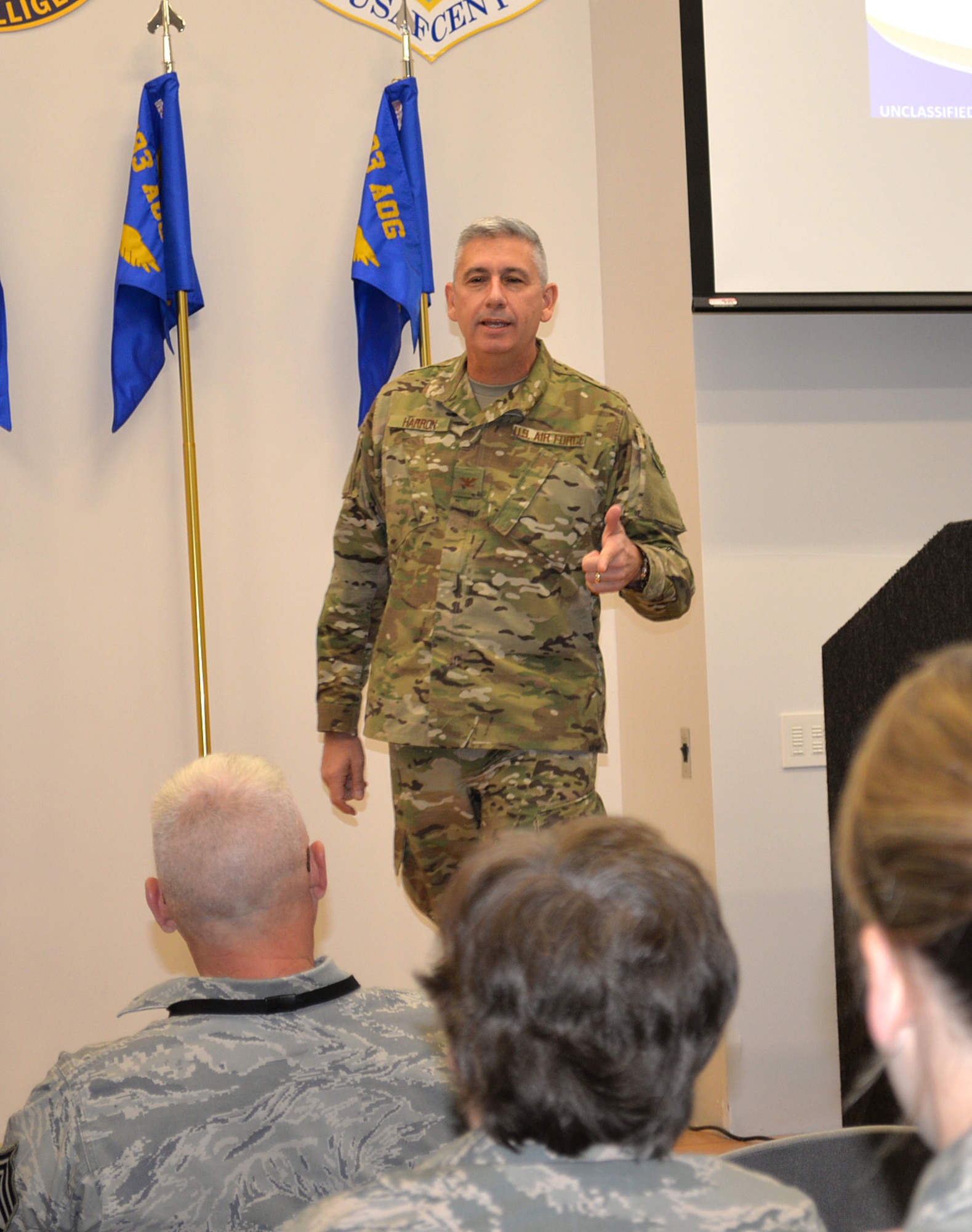 Col. Scott Harron, 193rd Air Operations Group commander, speaks to Airmen at the AOG during an all-call at the State College, Pa., unit Oct. 19, 2018. Prior to taking on the role as AOG commander Oct. 18, 2018, Harron served as the 25th Air Force Inspector General, and as Inspection Team Chief at Air Combat Command headquarters. He also served as commander of the 152nd Air Intelligence Squadron at Hancock Field Air National Guard Base, Mattydale, N.Y. Harron spent 16 years as an enlisted troop before commissioning as an Air Force intelligence officer in September 2000. (U.S. Air National Guard photo by 1st Lt. Susan Penning/Released)
